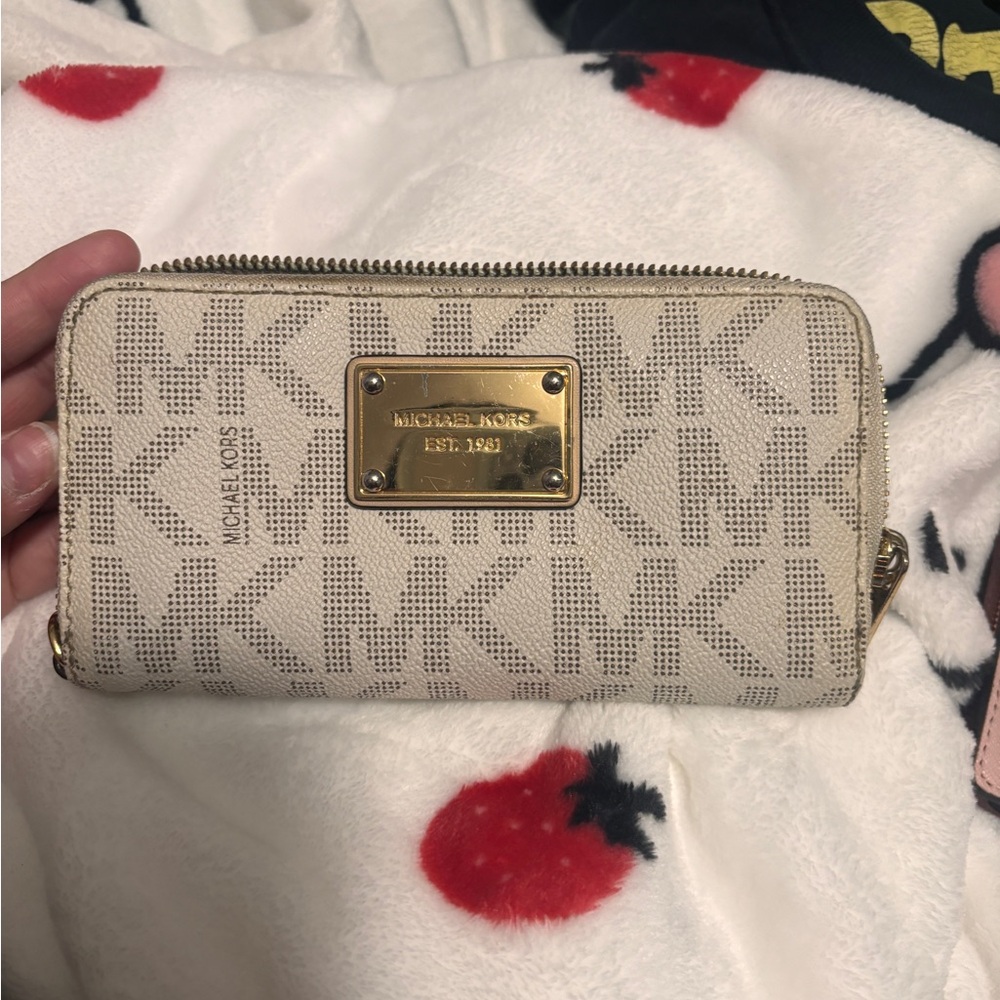 White gold MK wallet very beat up and dirty